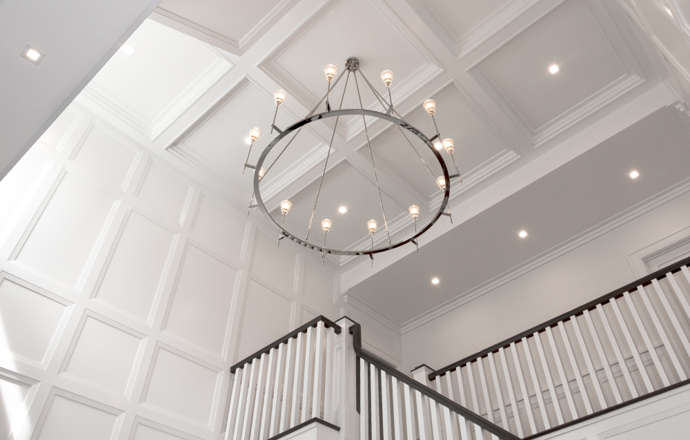 Bright Entry Coffered Ceiling with White Stair Detail